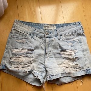 Women’s lowrise light wash distressed denim shorts